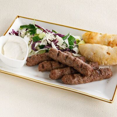 Чевапчичи из свинины и говядины в Чайхана Пахвала по цене 690 ₽