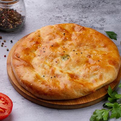 Осетинский пирог с курицей, картофелем и грибами в Пекарня Кулинария Пиццерия ОБОЖАЮТВСЕ! по цене 1200 ₽