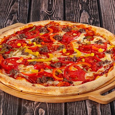 Пицца Мясная в Осетинские Пироги по цене 900 ₽