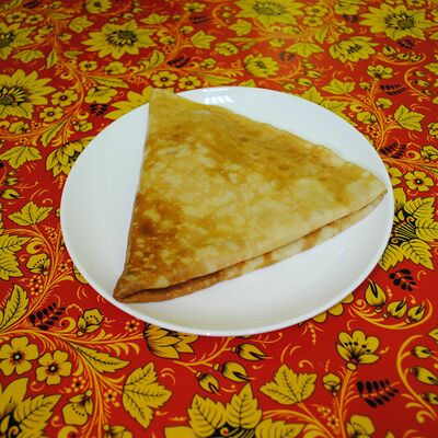 Блин с маслом в Масленица по цене 114 ₽