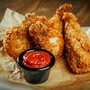 Куриные крылья в панировке в Мясорубка Angus по цене 680