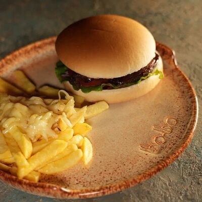 Бургер классический в Bo-bo lounge по цене 990 ₽