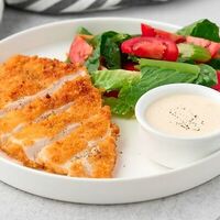 Шницель из курицы с соусом дорблю в Кафе Biscuit