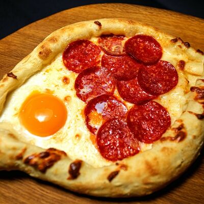 Хачапури по-аджарски с пепперони в Рога Лося по цене 350 ₽