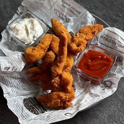 Стрипсы куриные в Жар-пицца по цене 360 ₽