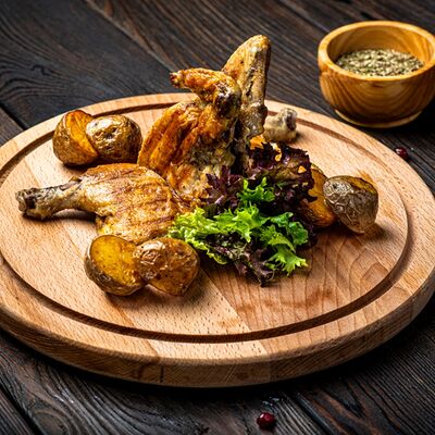 Цыплёнок целиком в Мархал по цене 775 ₽