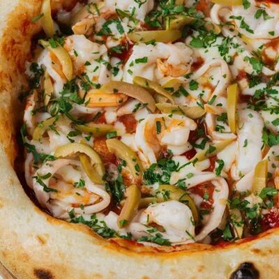 Креветки-кальмар-оливки в Gino Cafe по цене 1320 ₽