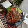 Гречка с куриной печеньюв Evа кафе по цене 400