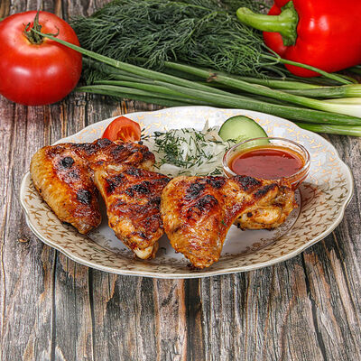 Шашлык из куриных крылышек в Чайхана Мадина по цене 447 ₽