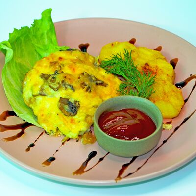 Куриная отбивная с грибами и сыром в У Сватов по цене 420 ₽