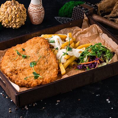 Шницель с картофелем фри в ШКВАРКИ по цене 25 р.