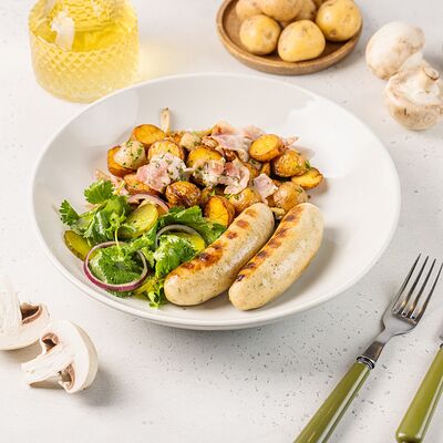 Колбаски мюнхенские с печёным картофелем, маринованным луком, обжаренным беконом и сладкой горчицей в АндерСон по цене 770 ₽