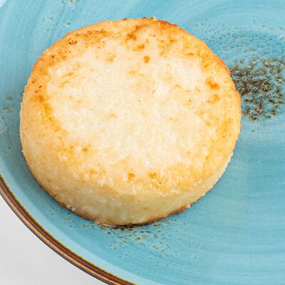 Фермерский сырник с кокосом в Вилка Ложка по цене 130 ₽