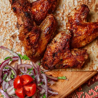 Куриные крылья со специями в Чито-Грито по цене 530 ₽