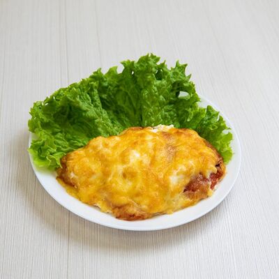 Куриная отбивная по-французски с помидором в Смак по цене 250 ₽