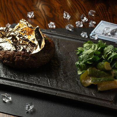 Бифштекс из мраморной говядины с брусничным соусом в Giorgio Suluguni по цене 1250 ₽