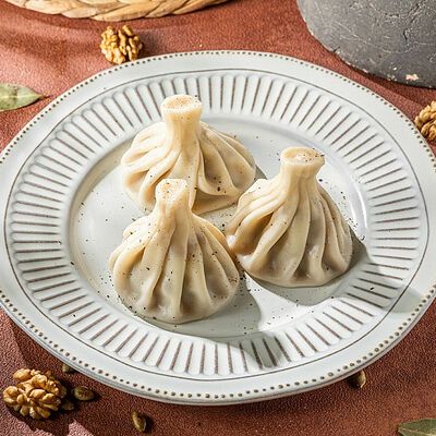 Хинкали с курицей (3 шт) в Джонджоли по цене 370 ₽