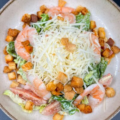 Салат цезарь с креветкой в Кафе Тепло по цене 490 ₽