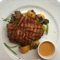 Отбивная из свинины в Manneken Pis