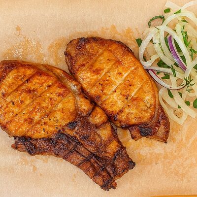 Свиная корейка (1 порция) в Вкусный дом по цене 520 ₽