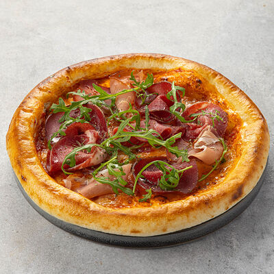 Пицца мясные деликатесы 22 см в Peperoni по цене 710 ₽