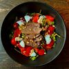 Салат с ростбифом и хурмой в Bocca Bar по цене 650
