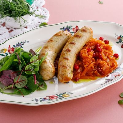 Колбаски куриные с тушеной квашеной капустой в Катюша Katyusha по цене 990
