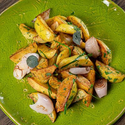 Картофель жареный в Christian по цене 650 ₽