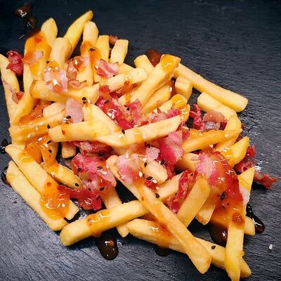 Картофель фри с беконом в Quattro pizza по цене 299 ₽