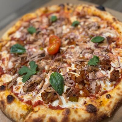 Пицца с печеными овощами и свининойв Foodlink по цене 650 ₽