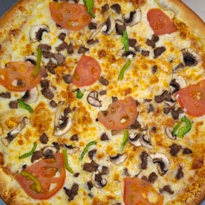 Мясная пицца с грибами в Shafran по цене 140000 сум