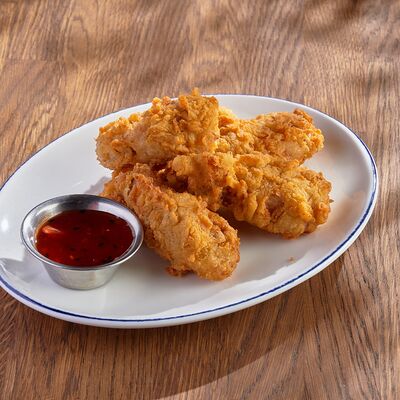 Куриные крылья в хрустящей панировке в Munhell по цене 710 ₽