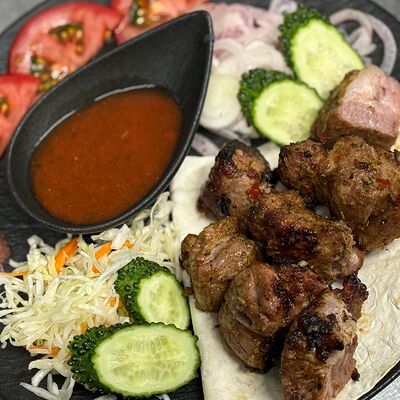 Шашлык из свиной шейки в Мясо на мангале по цене 650 ₽