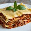 Мясная лазанья с соусами Болоньез и Бешамель в Фабрика-кухня ex. The Black Door по цене 31