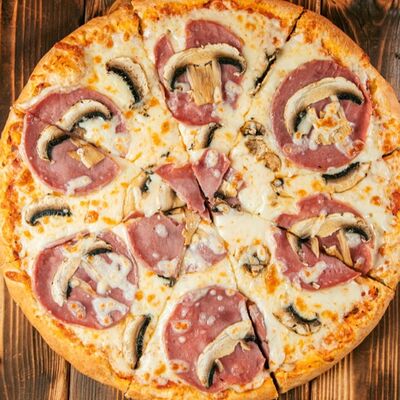 Пицца Ветчина и грибы топ в UNAGI ROLLS по цене 689 ₽