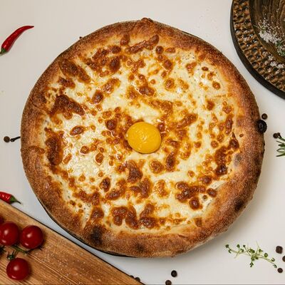 Пицца хачапури с сулугуни в Ели Поели по цене 990 ₽