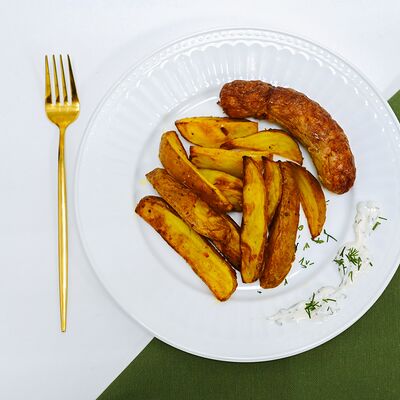 Колбаски с картофелем в Хлеб и сласти по цене 195 ₽