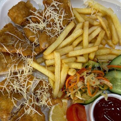 Шницель куриный в Чойхона Хаким Ака по цене 500 ₽