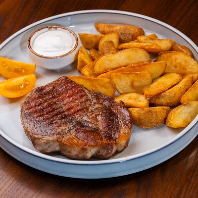 Стейк из свинины с картофельными дольками в Эдисон по цене 27 р.