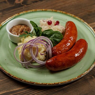 Колбаски пряные с сыром 2 шт. в Гастробар Феллини по цене 790 ₽