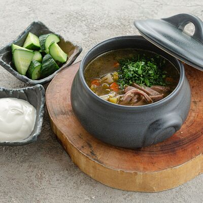 Суп Рассольник с томленой говядиной, перловкой и домашней сметаной в Welcome по цене 620 ₽