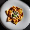 Тортеллини с уткой и рикоттой в соусе из порто и трюфельной пасты в Sartoria Lamberti по цене 1090