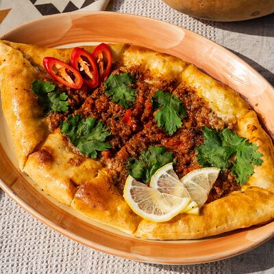 Пиде с телятиной в Хинкали & Эклеры по цене 530 ₽