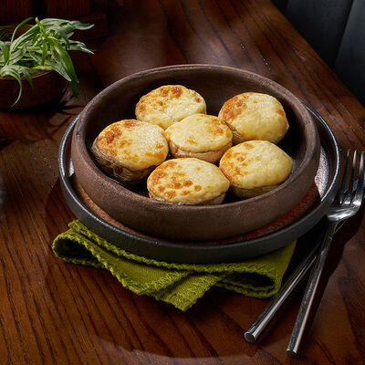 Шампиньоны запеченные с сыром в Маради по цене 590 ₽