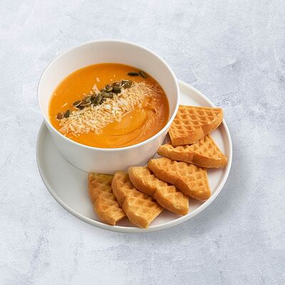 Тыквенный суп с пармезаном и вафлей в Vaffel по цене 470 ₽