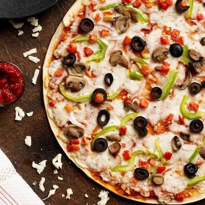 Пицца по-деревенски в Тетя Маргарита по цене 1400 ₽