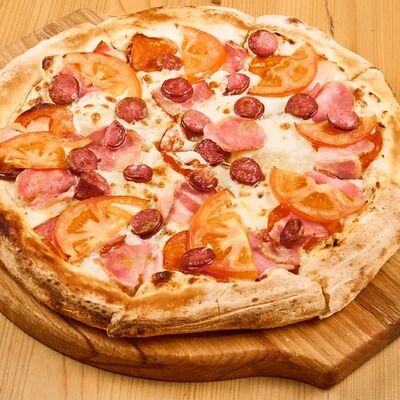 Пицца Мясное плато в 4 сыра по цене 910 ₽