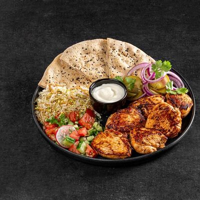 Шиш-таук на тарелке в Bright Israeli Grill по цене 450 ₽