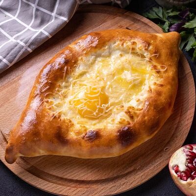 Хачапури по-аджарскив Гранд Терраса по цене 520 ₽