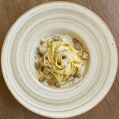 Паста с белыми грибами в Pizza Volante по цене 1170 ₽